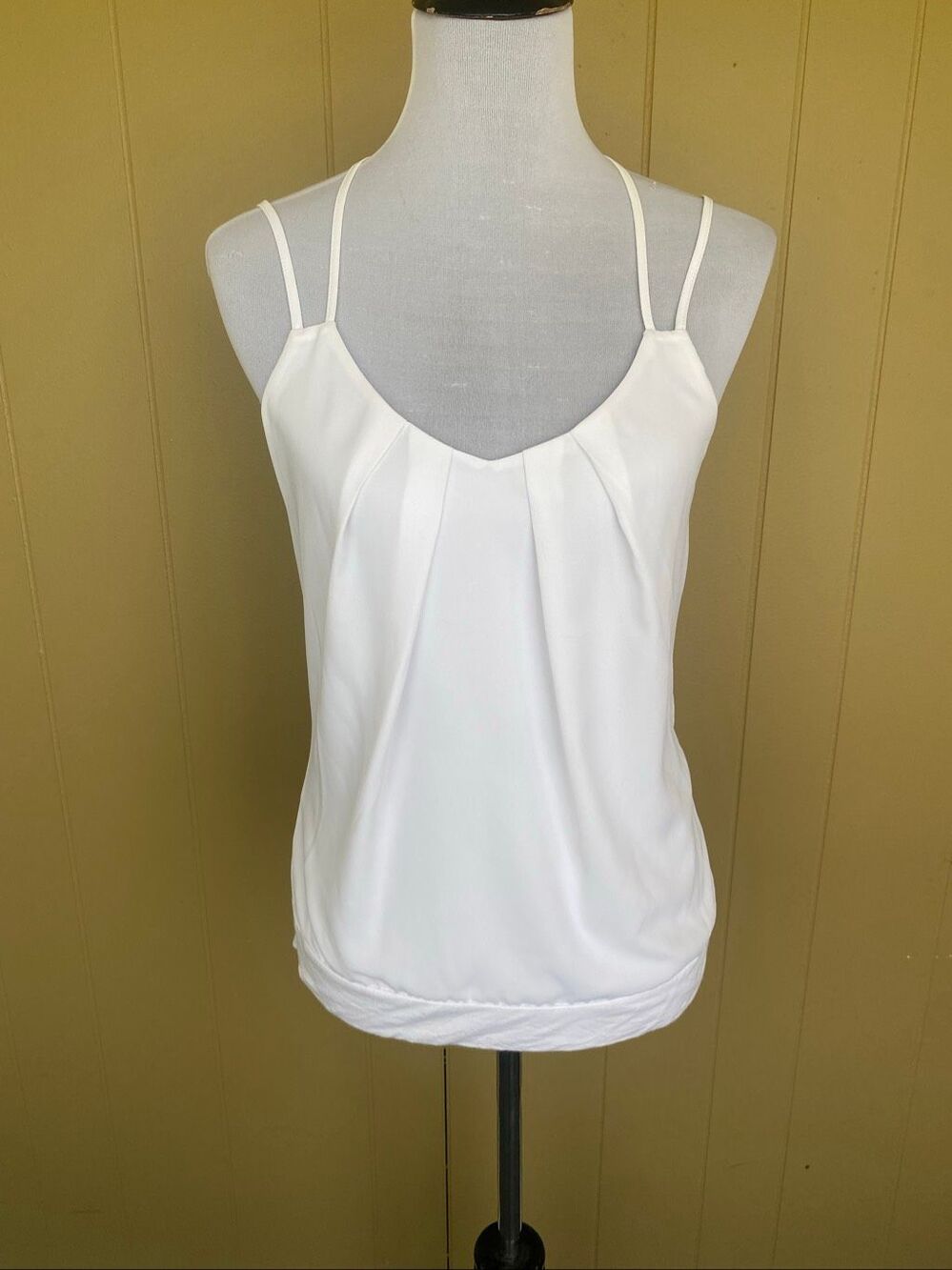 Express women S low cut tank top w/spaghetti straps and racerback floral back wh